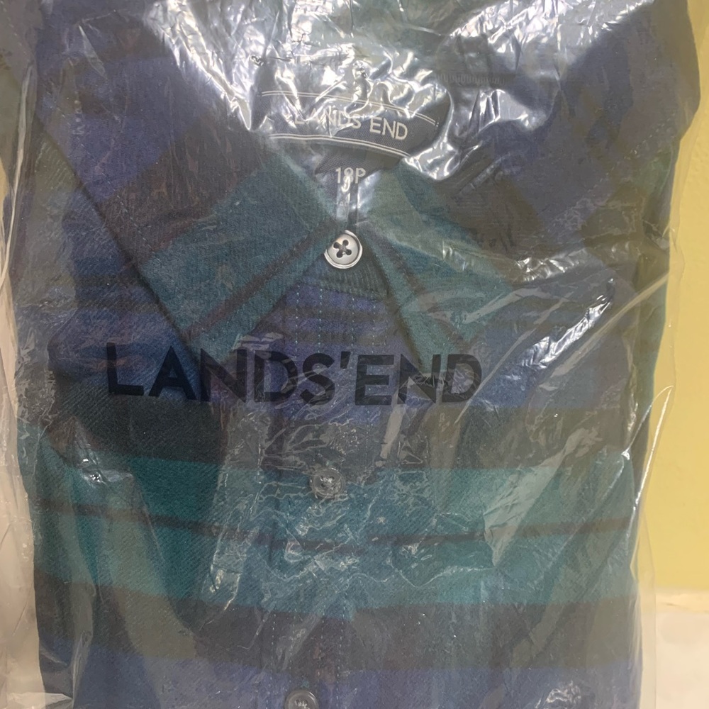 Warm and comfortable black watch plaid flannel shirt.